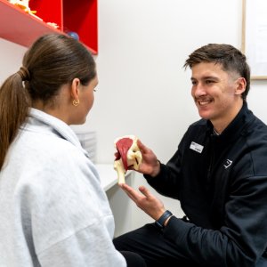 Podiatrist explaining an individual heel spur treatment plan in Toowoomba