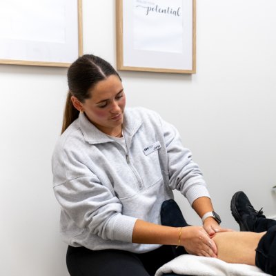 Podiatrist treating a patient's heel pain in Toowoomba